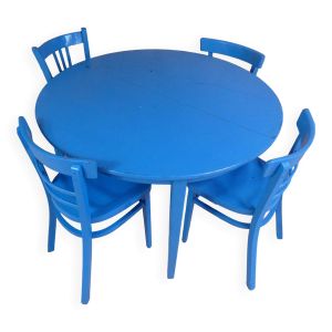 table ronde avec 4 chaises et 2 rallonges