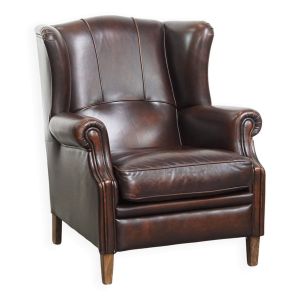 Fauteuil à oreilles de style anglais en cuir de vachette