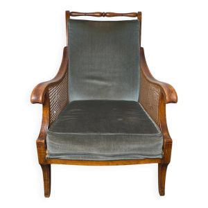 Fauteuil bergère style Régence en bois, tissu et cannage