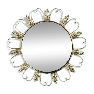 Miroir rond sur cadre laiton à volutes