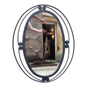 Miroir ovale vintage en fer forgé à décor de spirales