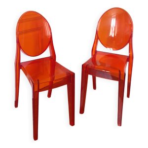 2 Chaises orange Victoria Ghost design Starck éditées par Kartell