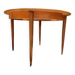 Table ronde avec rallonges incorporées