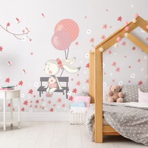 Stickers lapine dans le jardin fleurie