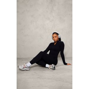 Femme Combinaison structurée côtelée noire détail contours à zip | Taille Small - Taille S