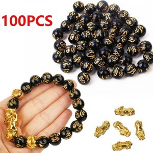 50/100 pi&egrave;ces bouddha breloques perles couleur noire dor&eacute;e avec sculpture or Dragon chinois Pixiu