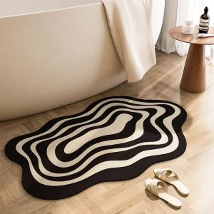 Tapis de sol absorbant irr&eacute;gulier noir et blanc pour porte de salle de bain, toilettes de salle de