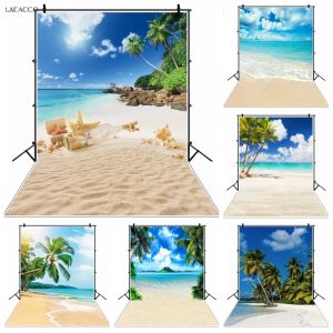 Onure de mer plage photographie fond sable palmiers feuilles d'arbre ciel nuageux vue Photophone